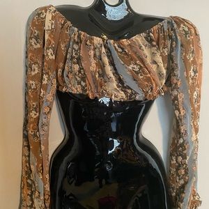 Pretty brown flowered romantic half top.